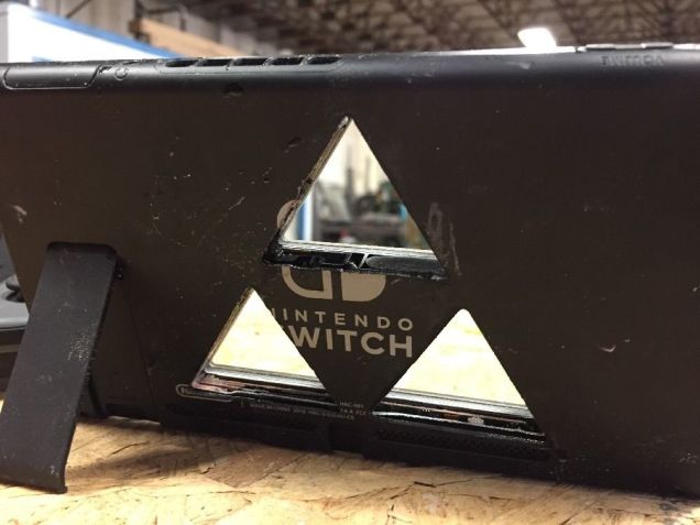 From eBay: “This is the only Switch that has a triforce cut into the screen….This item doesn’t wor